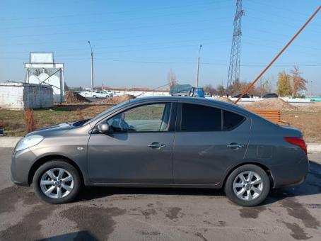 Nissan sunny 2012yil 145000km